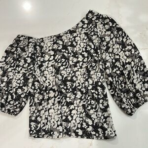 From Evereve. Off one shoulder black and white blouse.